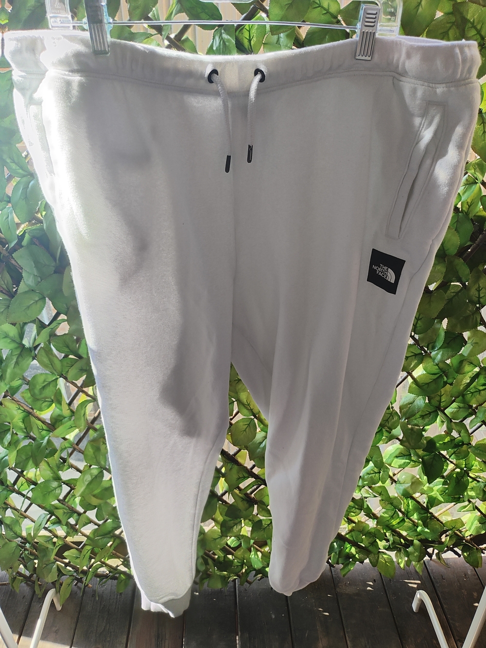 The North Face Men's White Fleece Joggers with Logo Patch